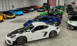 Showroom filled with exotic cars in various colors
